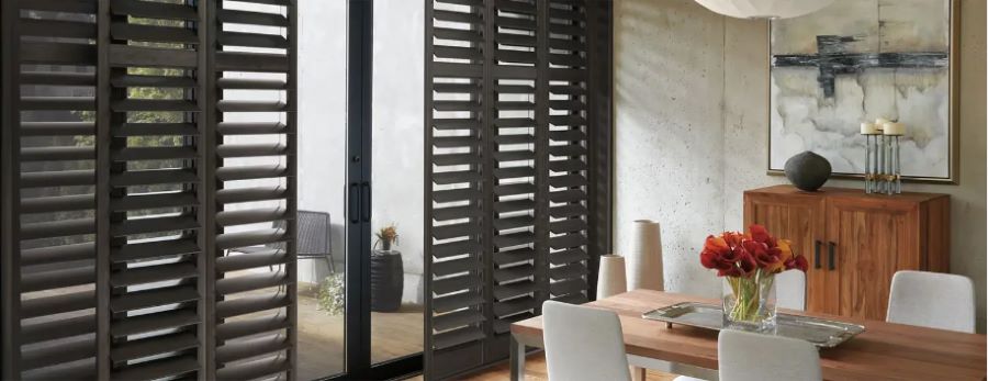 Close-up of plantation shutters in a Melbourne dining room.