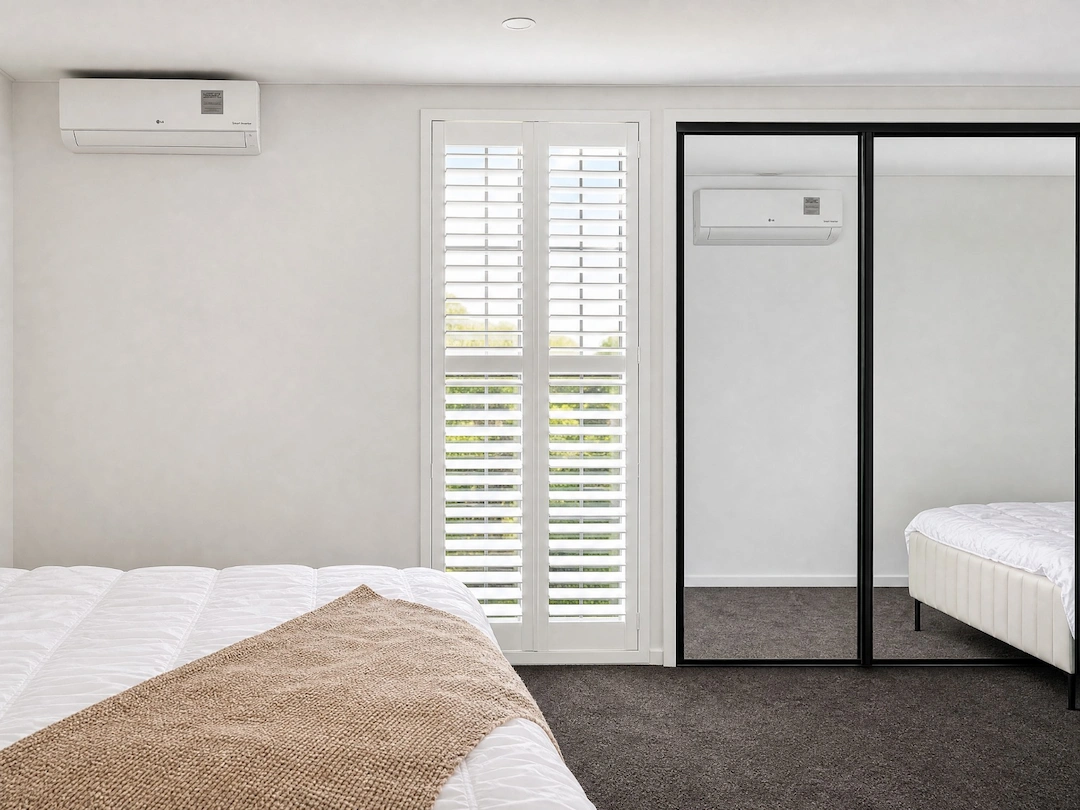 Plantation shutters bedroom Melbourne — modern minimalist interior with white shutter panels