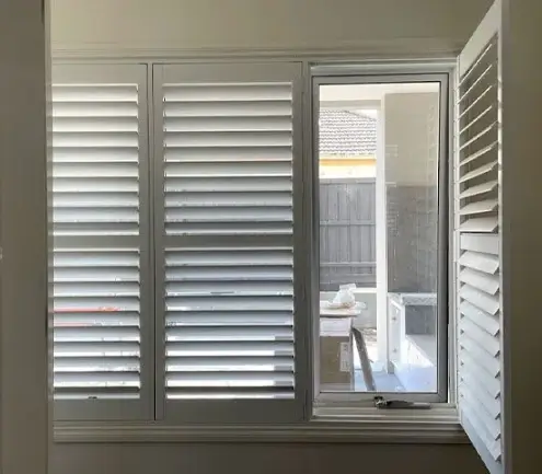 Basswood hinged shutters installed in a Campbellfield home