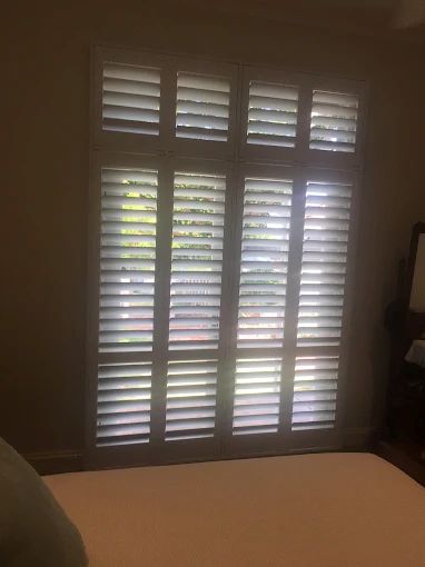 Plantation shutters providing light control but not full blackout
