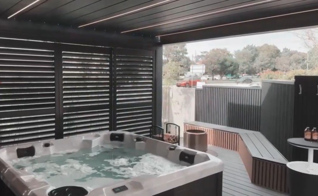 Outdoor aluminium plantation shutters providing shade and privacy