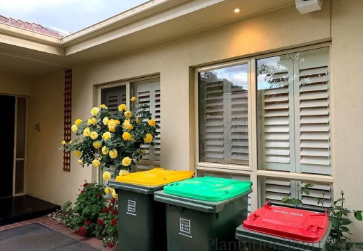 Plantation shutters sized for large front windows