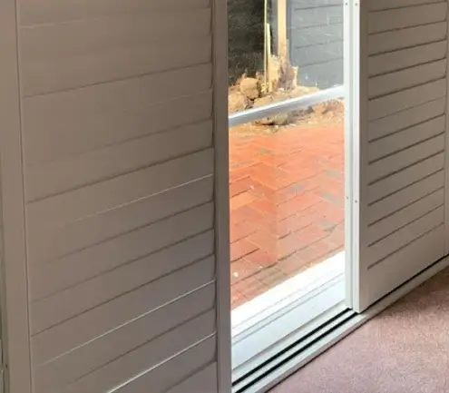 Sliding shutters running on a bottom floor glide