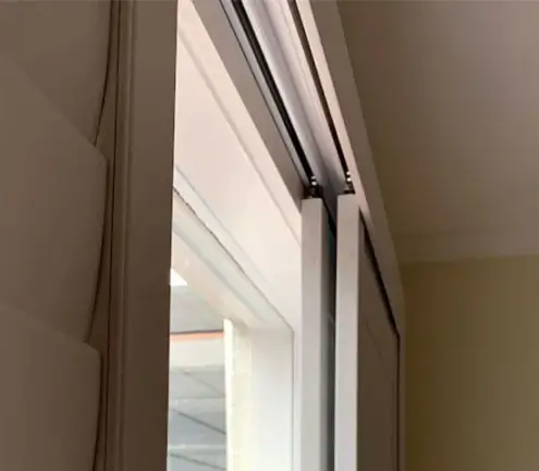 Sliding shutters running on a top track